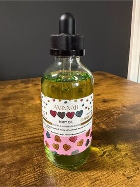 Aminnah “XOXO” Body Oil. NEW